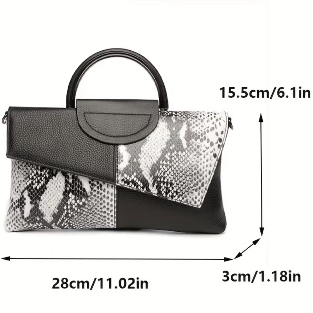 Luce black and white snakeskin clutch bag